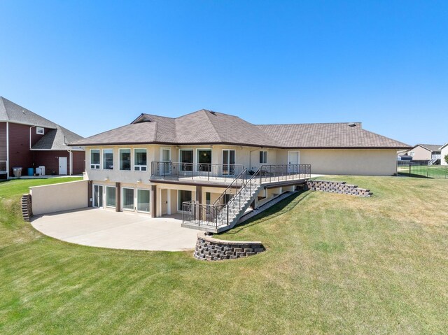 ranch-style home with a garage and a front yard