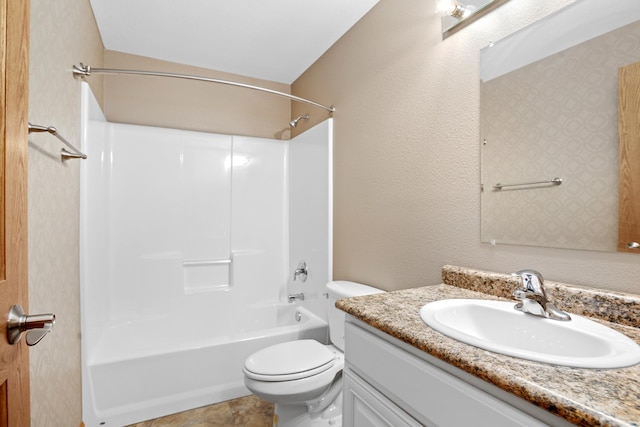 full bathroom featuring vanity, toilet, and shower / washtub combination