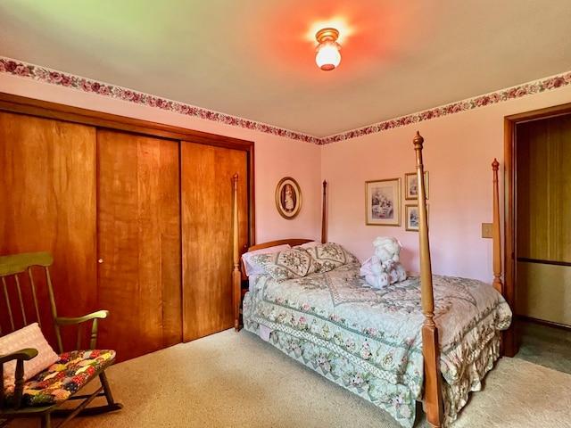 bedroom with carpet flooring and a closet