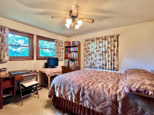 bedroom featuring carpet and ceiling fan