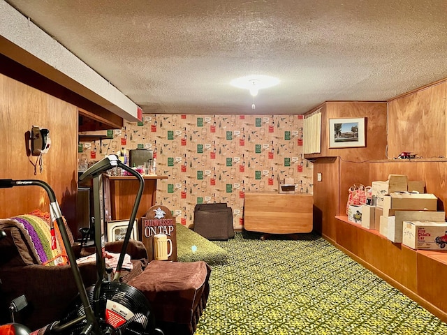 interior space with carpet flooring and a textured ceiling