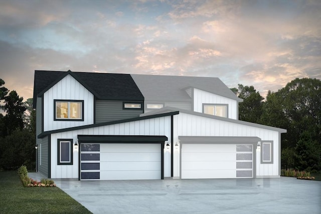 modern farmhouse featuring a garage