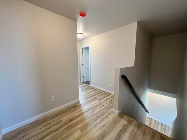 hall featuring light hardwood / wood-style floors