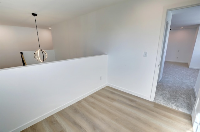 hallway featuring hardwood / wood-style floors