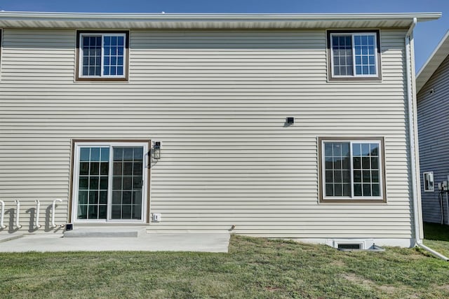 exterior space with a yard and a patio area