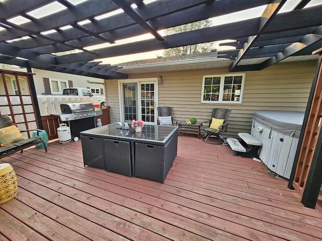 wooden deck with a grill and a pergola