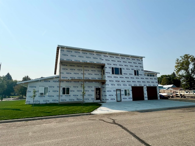 property under construction with a front yard