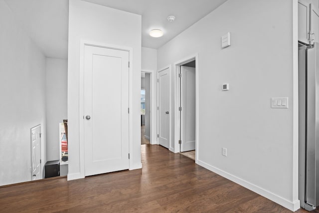 2424 Landmark Dr, Minot, ND 58703 - interior space featuring baseboards and wood finished floors