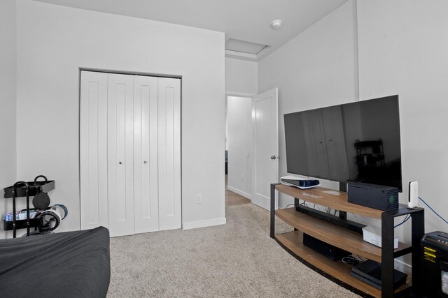 2424 Landmark Dr, Minot, ND 58703 - carpeted bedroom with baseboards and a closet