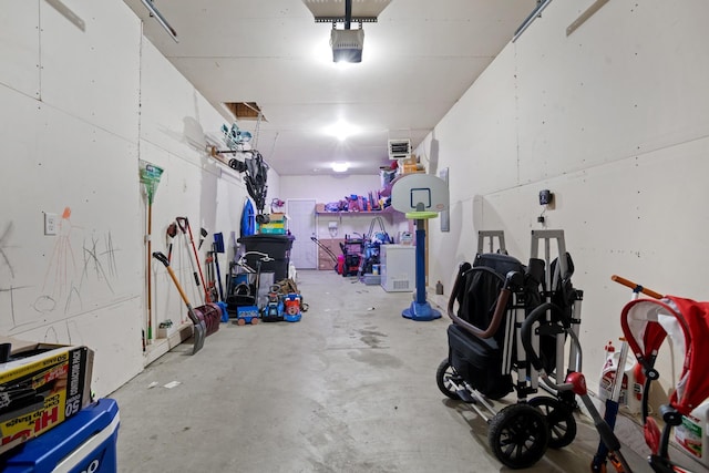 2424 Landmark Dr, Minot, ND 58703 - garage featuring a garage door opener