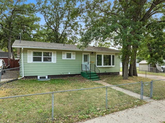 ranch-style house featuring a front lawn