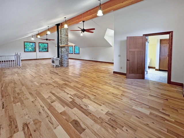 unfurnished living room with beam ceiling, light hardwood / wood-style floors, ceiling fan, and high vaulted ceiling