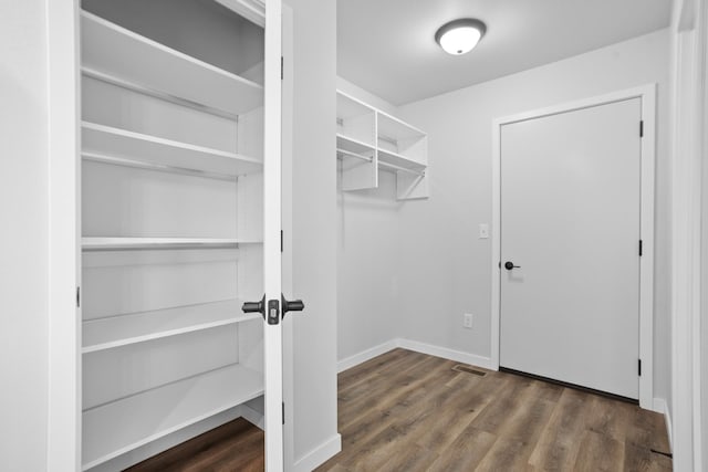 interior space featuring dark wood-type flooring