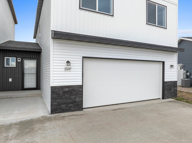 garage with central AC unit