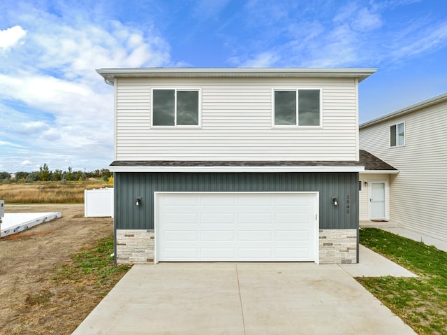 view of front of property with a garage