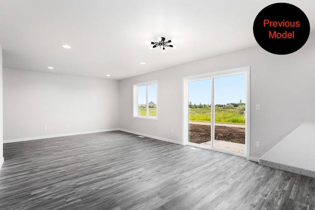 empty room featuring hardwood / wood-style floors