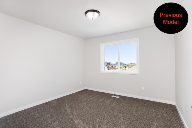 unfurnished room with carpet floors