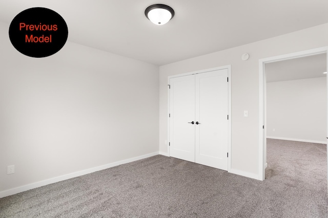 unfurnished bedroom featuring a closet and carpet