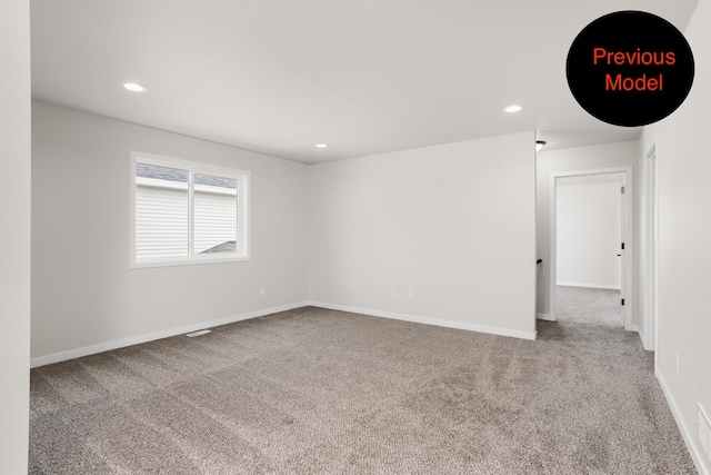 view of carpeted spare room