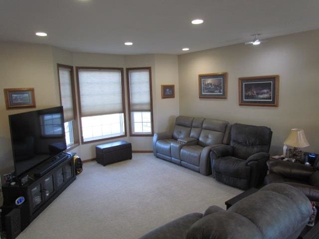 living room featuring light carpet