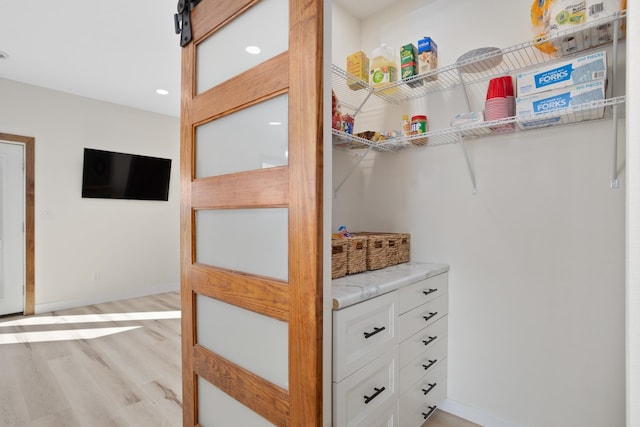 spacious closet with light wood-type flooring