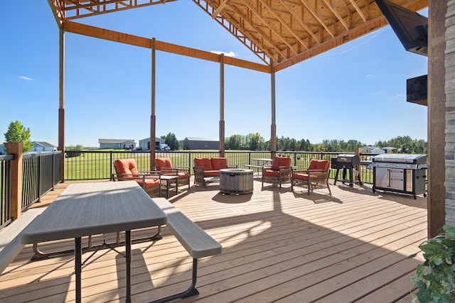 wooden deck featuring an outdoor hangout area, a gazebo, and grilling area