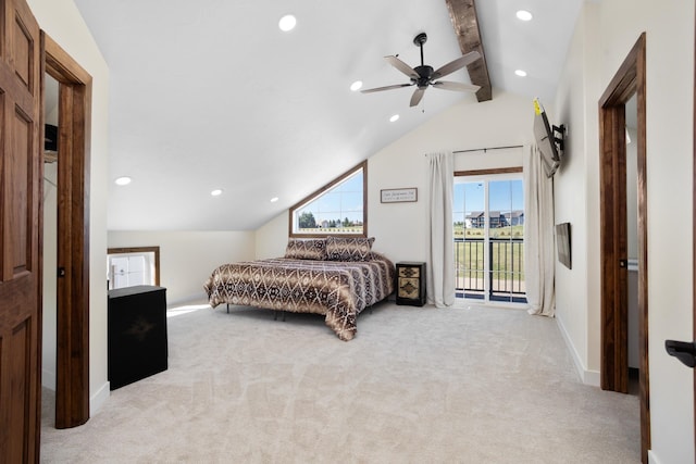 bedroom featuring multiple windows, lofted ceiling with beams, ceiling fan, and access to exterior