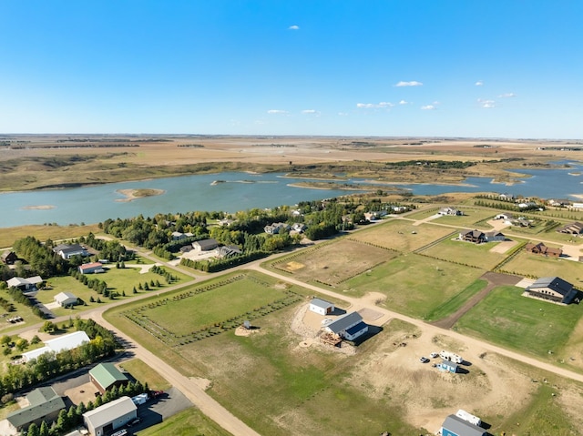 bird's eye view featuring a water view and a rural view