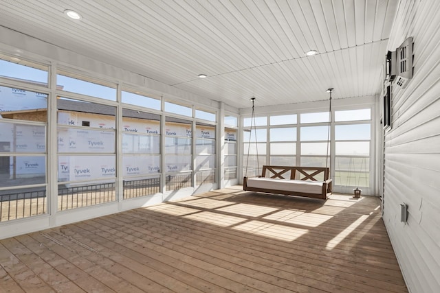 unfurnished sunroom with wooden ceiling