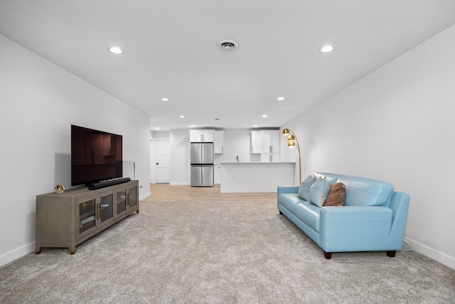 living room with light carpet