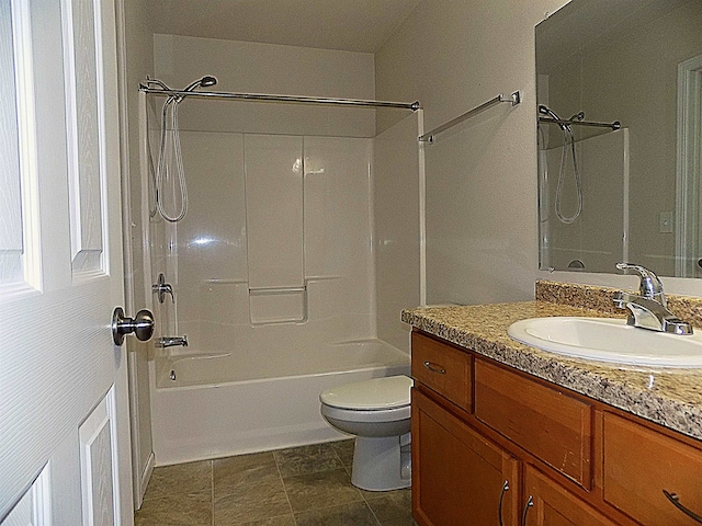 full bathroom featuring shower / tub combination, vanity, and toilet