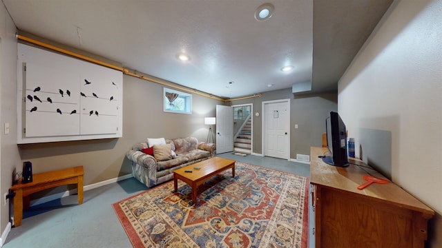 living room featuring concrete floors