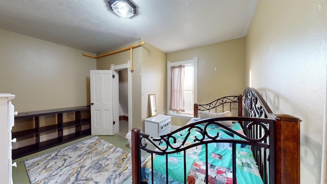 bedroom with a textured ceiling