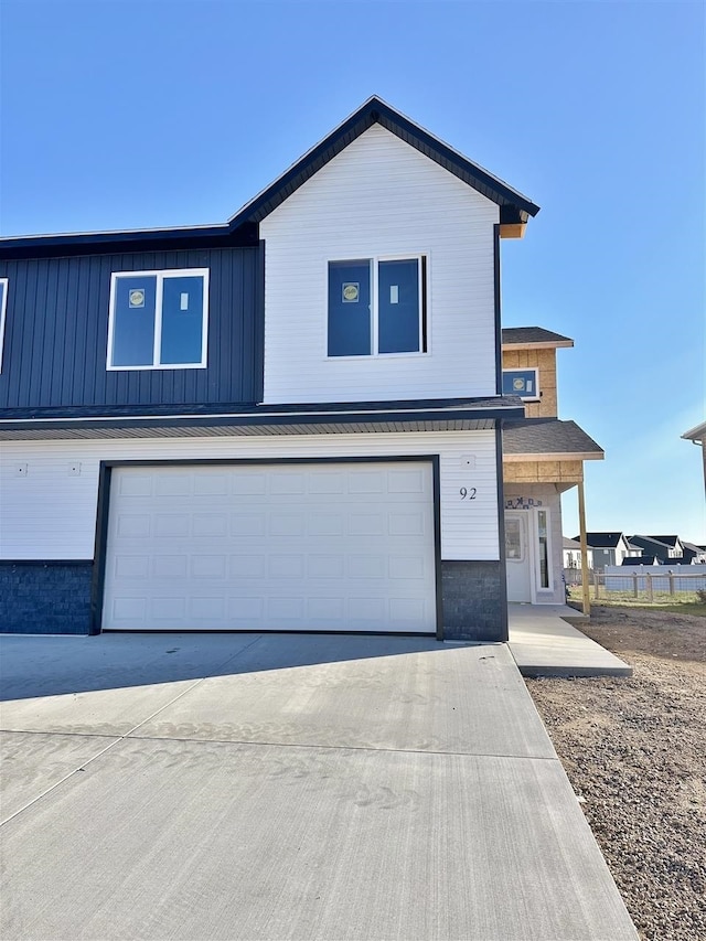 view of front of property with a garage