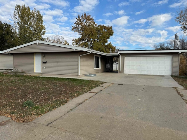 ranch-style home with a garage