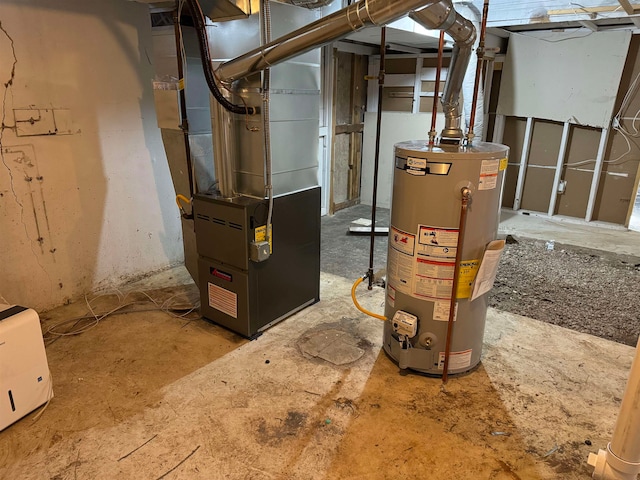 utility room featuring water heater and heating unit