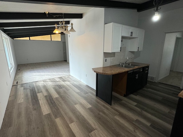 kitchen with vaulted ceiling with beams, white cabinets, sink, and dark hardwood / wood-style flooring