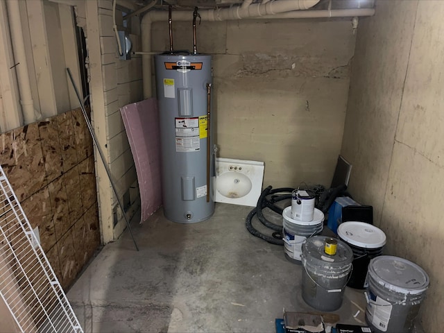 utility room featuring electric water heater