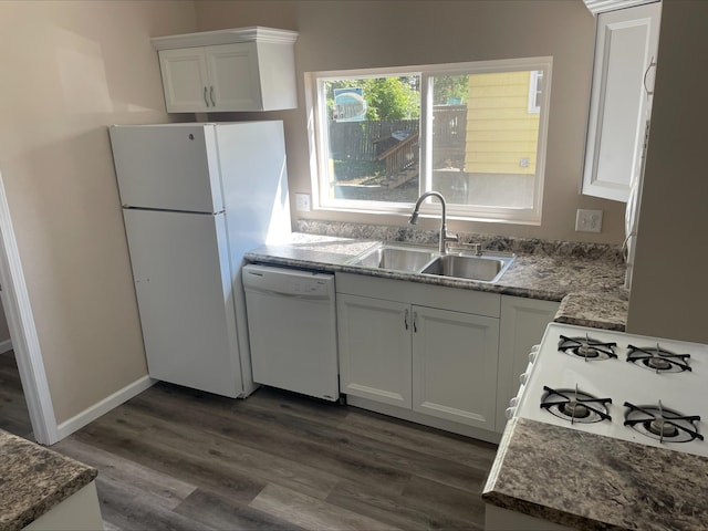 kitchen featuring white appliances, white cabinetry, sink, and dark wood-type flooring