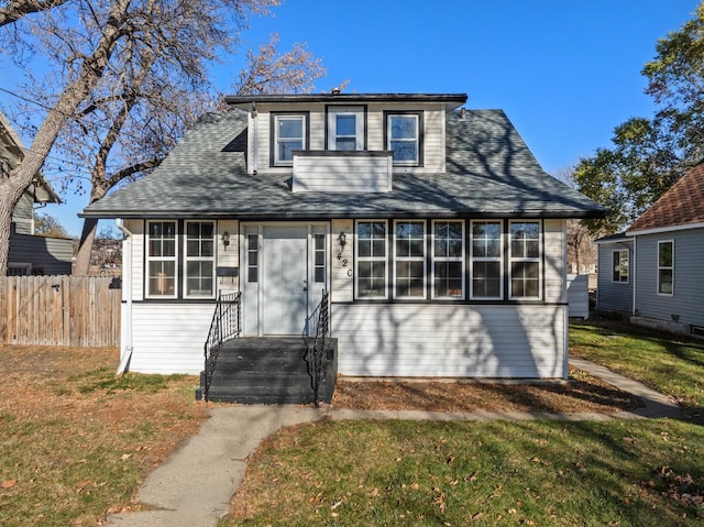 bungalow with a front yard