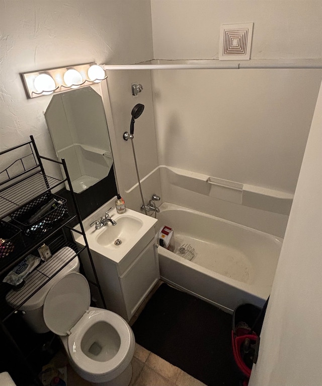 full bathroom with tile patterned flooring, vanity, toilet, and  shower combination