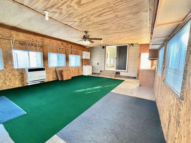 6 4th Ave, Towner, ND 58788 - unfurnished sunroom with heating unit