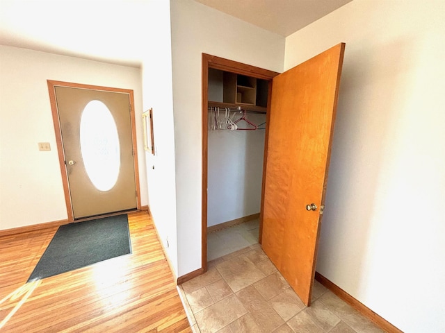 6 4th Ave, Towner, ND 58788 - entrance foyer with baseboards and light wood finished floors