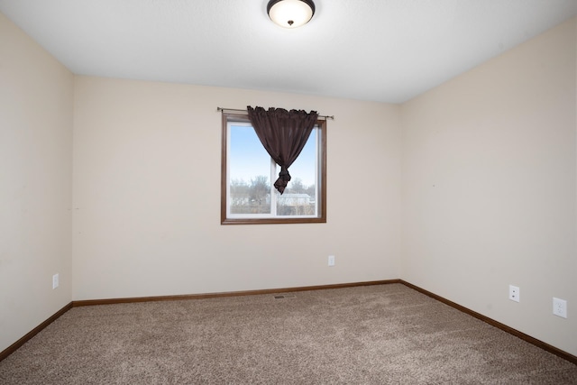 spare room with carpet