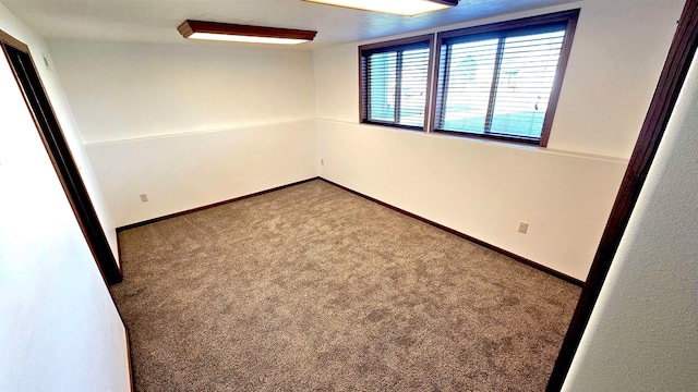 unfurnished room featuring carpet floors