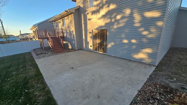 view of patio terrace at dusk