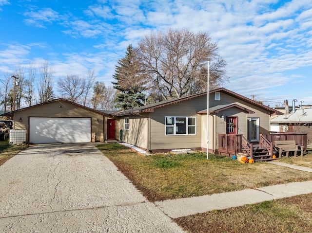 view of front of house with a garage, a wooden deck, and a front lawn