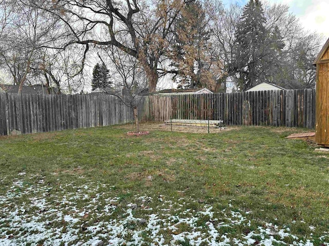 view of yard layered in snow