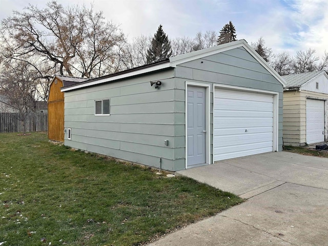 garage with a lawn