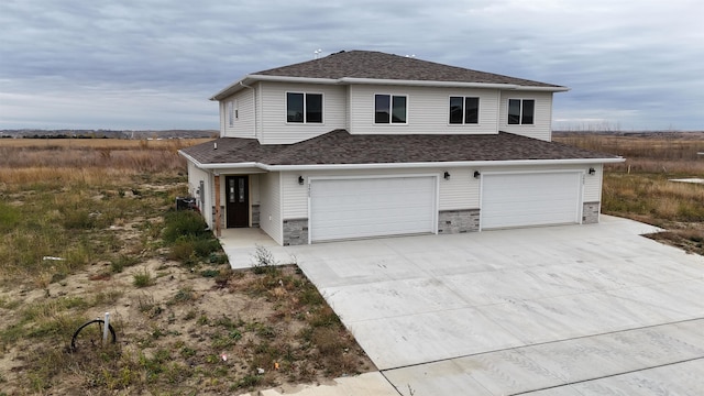 view of front property with a garage